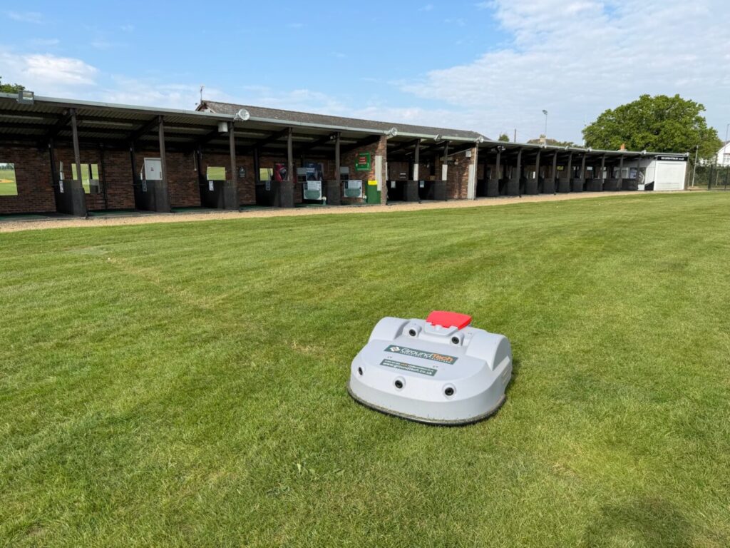 drop-pit golf ball collector on driving range